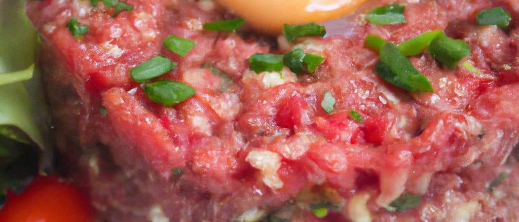 Various styles of gourmet meat tartares on elegant plates