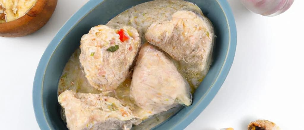 assorted plain quenelles on rustic wood board with herbs