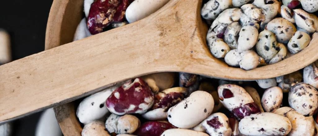 assorted common beans in various packaging on rustic backdrop