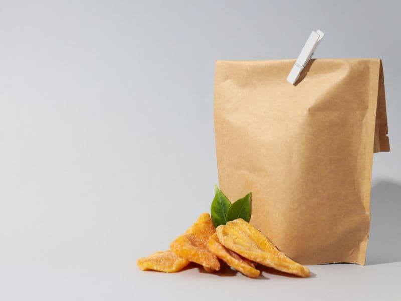 Dried mango chips with kraft paper packaging