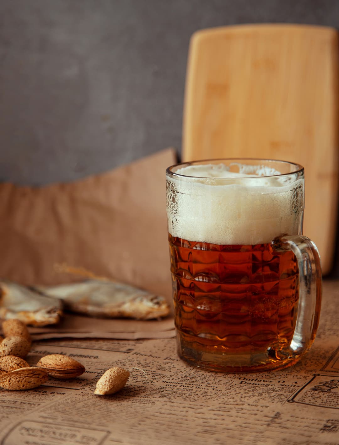 a glass of beer on a table