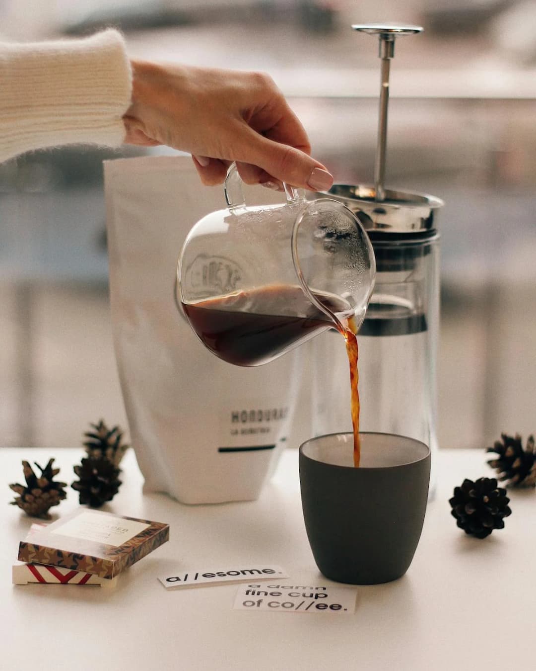 pouring coffee in a cup