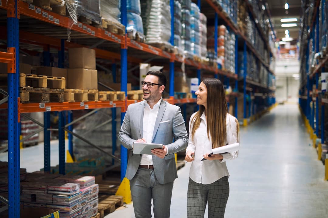 male and female workers in warehouse